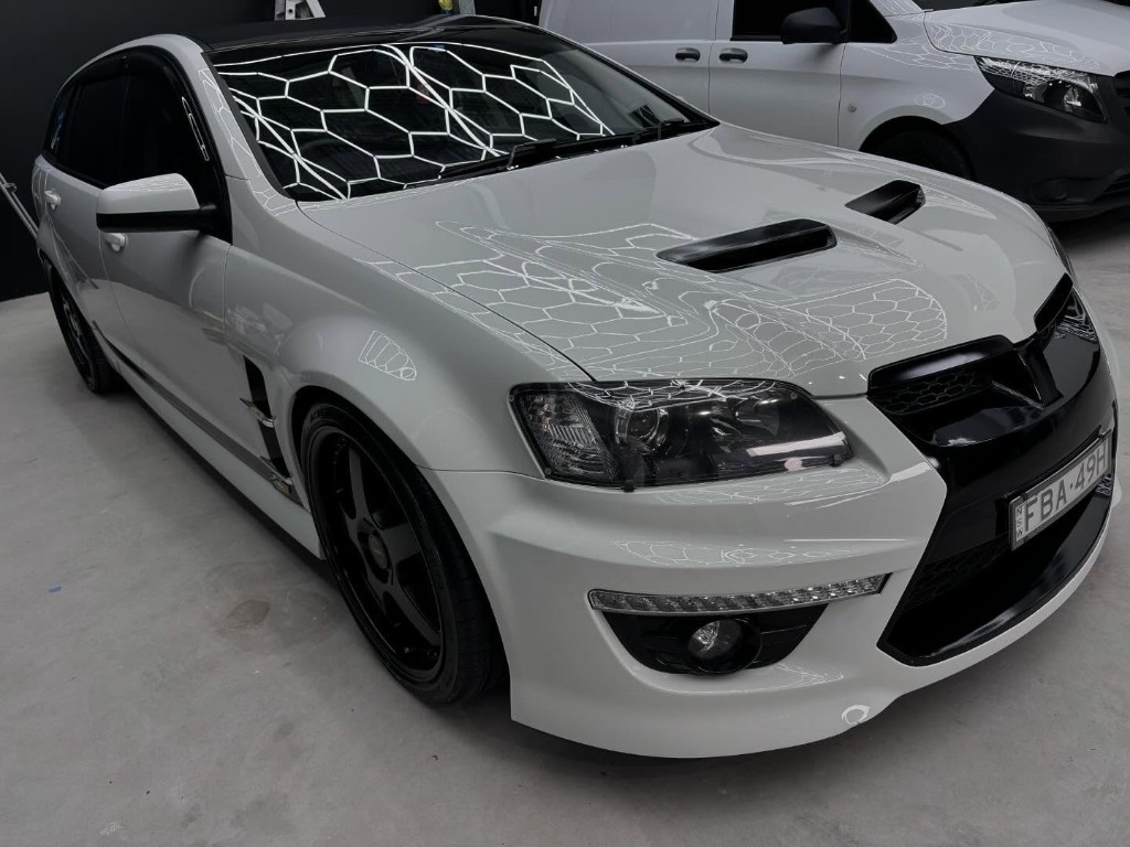 Premium vehicle ceramic coating in Coastline workshop