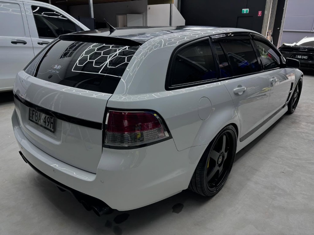 Grey Mitsubishi Evolution rear with gloss reflection