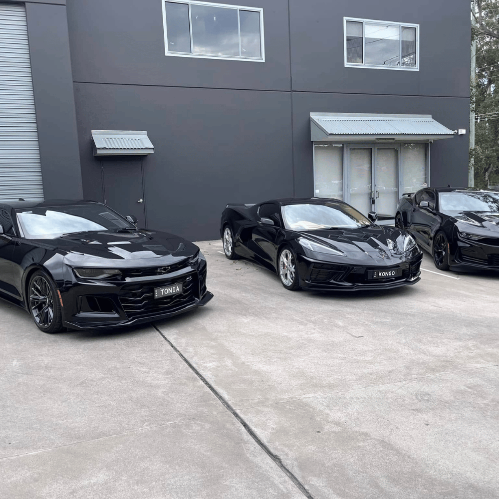 Black Chevrolet Corvette and Camaros ceramic coated at Coastline workshop